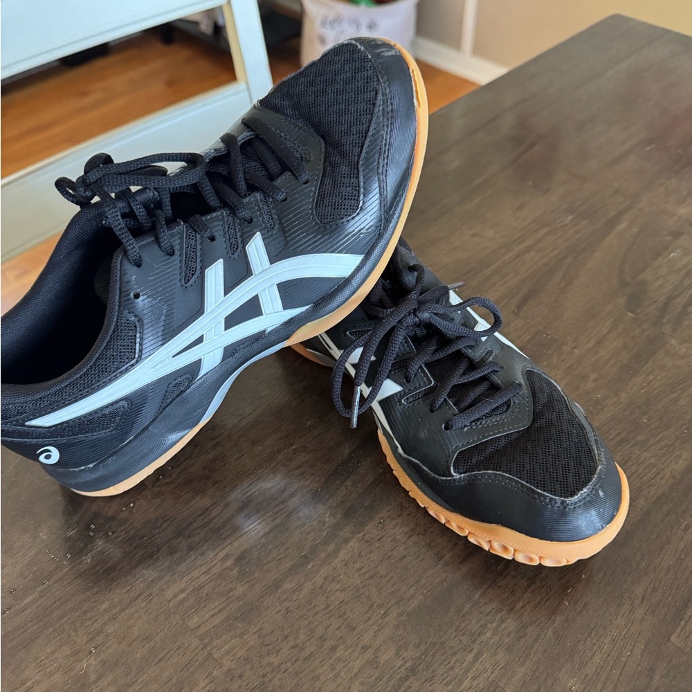 ASICS Black and Gray volleyball sneakers.